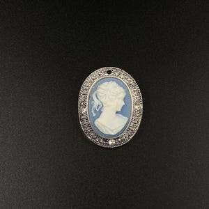Primadonna Raffaella on gem brooch, blue plastic gem with rhinestones and sapphire, silver brooch, elegant pin