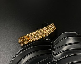DKNY Armband Gold elastisch, Steel, Markenschmuck, vergoldeter Edelstahl mit Stein, Geschenk zum Muttertag