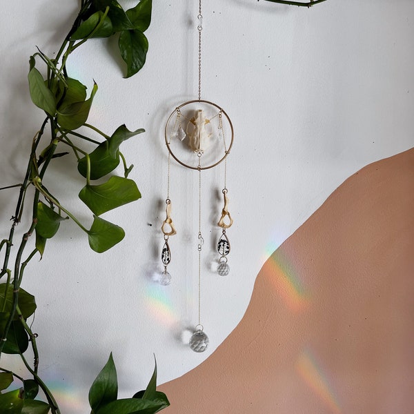 Gold sun catcher with real mink skull and pressed wildflowers Curiosity & oddities