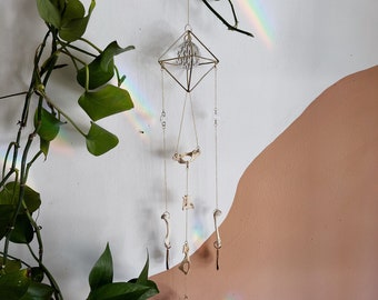 Gold sun catcher with real animal bones and real pressed wildflowers Curiosity & oddities