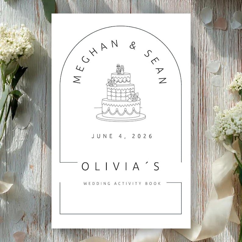May include: A white rectangular wedding activity book cover featuring a black line art illustration of a three-tiered cake with a couple topper inside an arch. The text reads MEGHAN & SEAN, JUNE 4, 2026, OLIVIA'S, and WEDDING ACTIVITY BOOK.