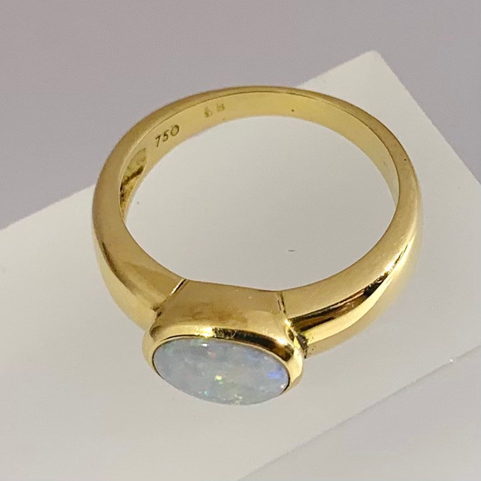 Opal 18kt gold ring in modern oval bezel setting | Etsy
