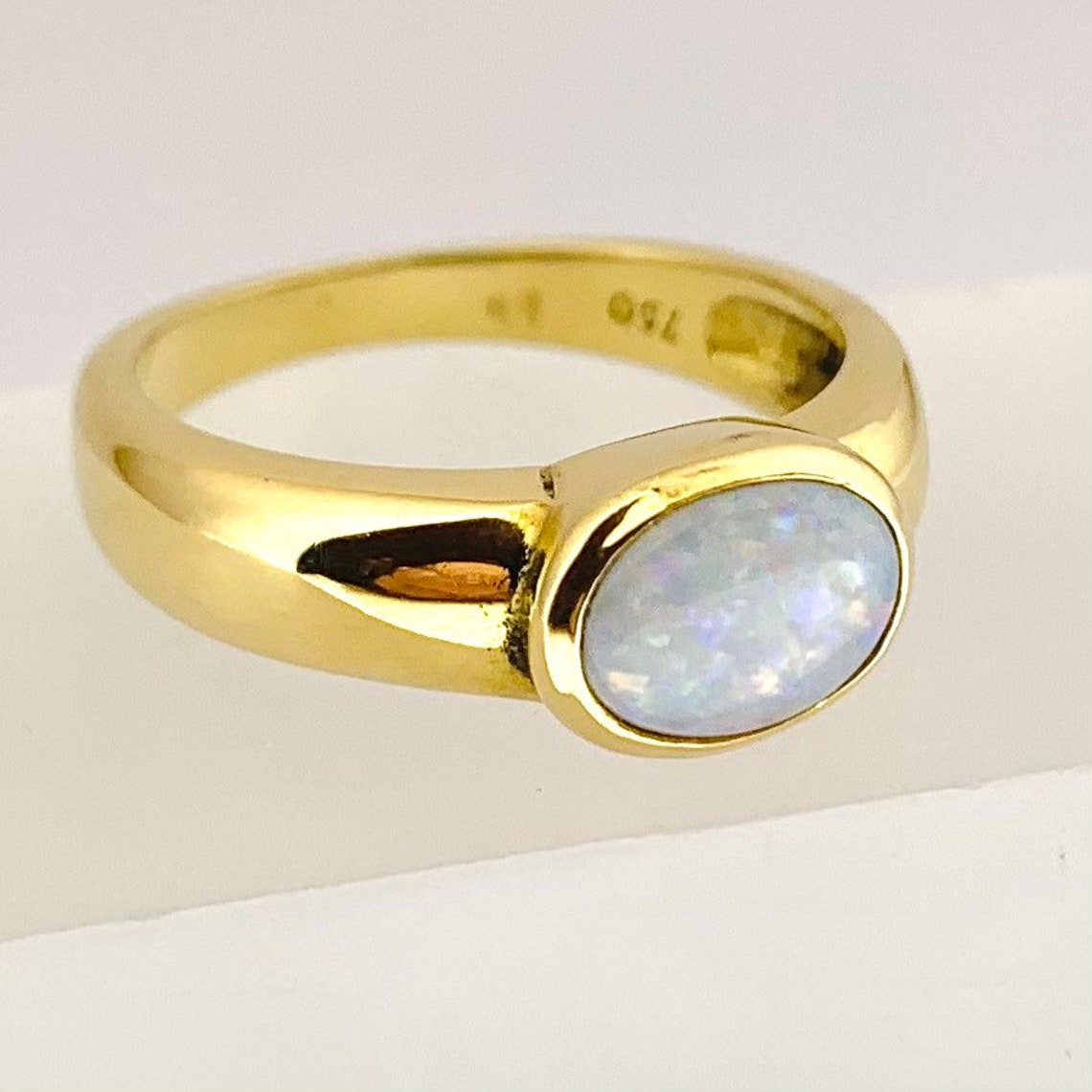 Opal 18kt gold ring in modern oval bezel setting Etsy