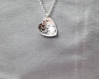 Silver textured concave heart pendant