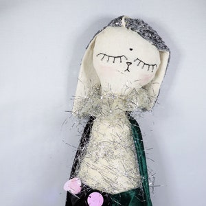 Bunny rag doll with bow tie ears, sequin pants and shimmering ruffled collar top. Fabric handmade rabbit toy. Heirloom doll. Easter gift.