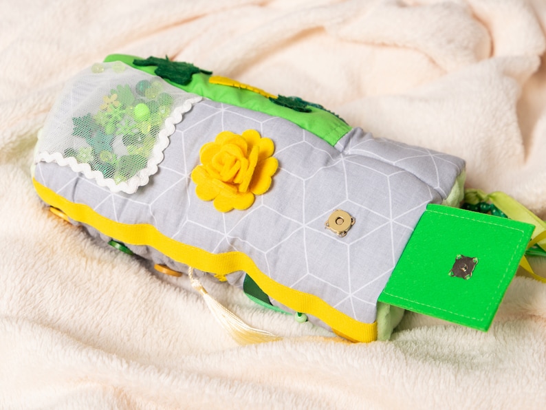 Pocket where you can put a postcard or nice little things. Decorated with felt