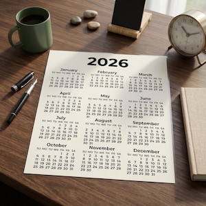 Printable 2026 calendar digital download with a simple year-at-a-glance design showing all 12 months on one easy-to-read page. This instant download includes black and white, coloured, and fantasy-style calendar versions in multiple sizes, ideal for printing at home and using for yearly planning, office organisation, school schedules, goals, holidays, deadlines, and important dates.