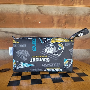 Jacksonville Jaguars Zipper Pouch: Travel Accessory Bag