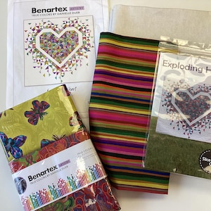 May include: A close-up of a fabric bundle with a colorful striped fabric, a green fabric with the text "Exploding Heart" and a fabric with a floral pattern. The fabric bundle is labeled "Benartex ARTISTRY TRUE COLORS BY DANIELLE DUER".