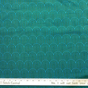 May include: Teal fabric with a repeating arch pattern in shades of teal and blue. The fabric has a ruler along the bottom with the text "No, I will not hem your pants."