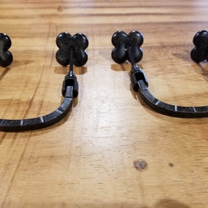 2 Iron Flower Ring Pulls - Rust Color.  2 Hole