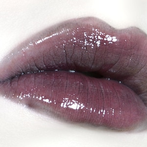 The Shallows Lip Gloss - Sheer Smoky Black