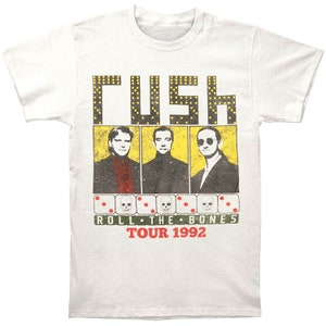 May include: White t-shirt with a vintage-style graphic of the band Rush. The graphic features the band's name in large, bold letters with a yellow background and three images of the band members. Below the band members are dice with skulls and the text "Roll The Bones Tour 1992".