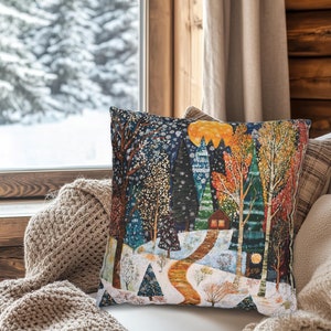 This winter folk art inspired pillow design features a colorful winter forest with a path leading to a cozy home. Choose whether or not to have a pillow insert - our covers are printed upon order in the US with outdoor options.