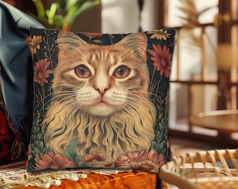 May include: A decorative throw pillow with a colorful floral design featuring a realistic illustration of a ginger cat with green eyes. The pillow is on a brown couch with a patterned rug.