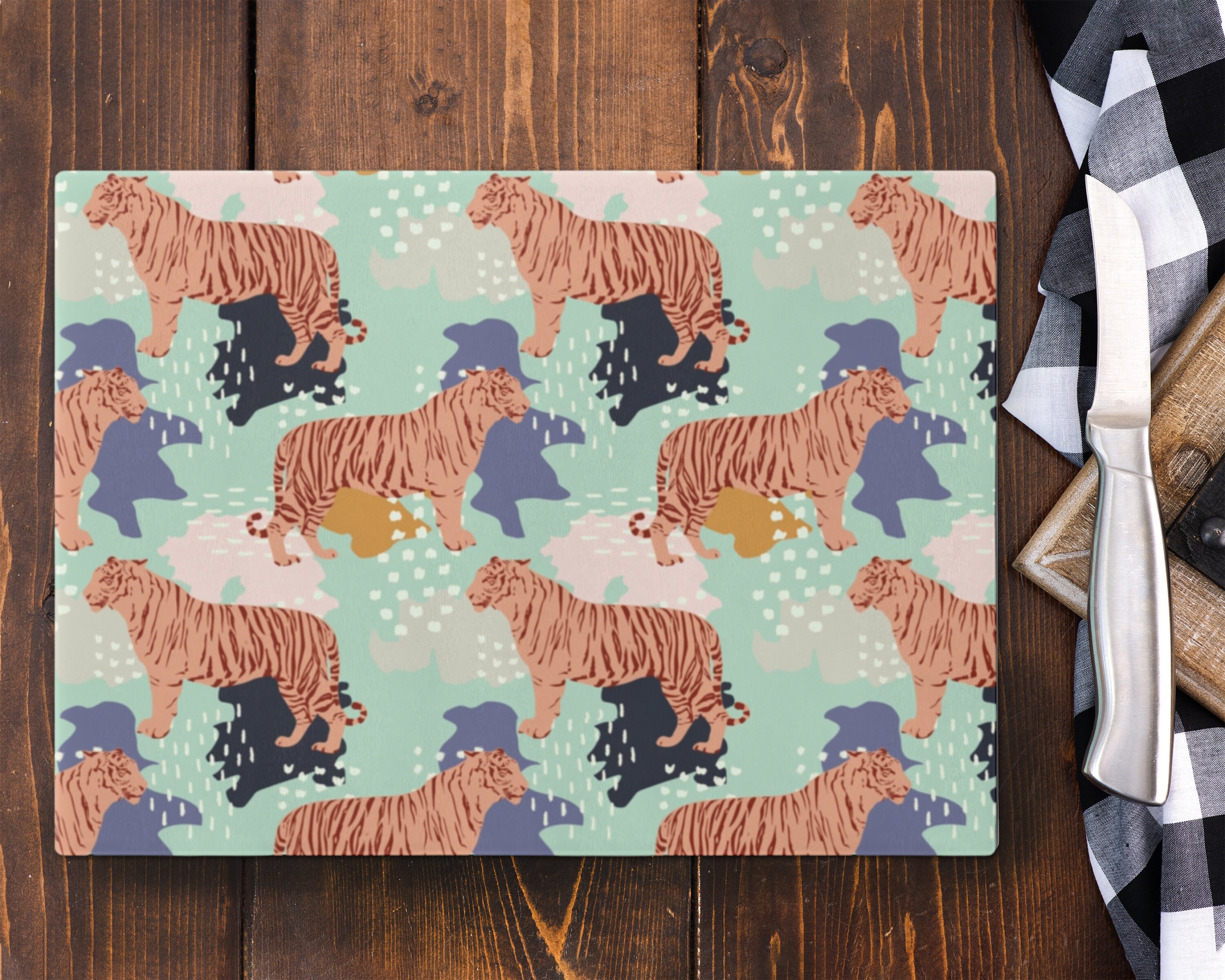 Planche à découper ronde en verre trempé motif tigre dans la