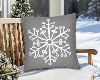 Almofada decorativa com estampa de floco de neve - Branca sobre cinza, com opções para uso interno e externo em vários tamanhos. Almofadas decorativas de inverno, almofadas fofas com estampa de floco de neve.