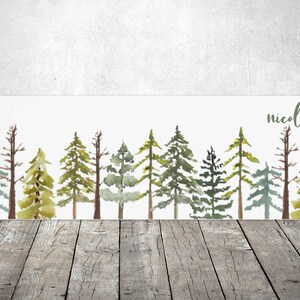 May include: A watercolor painting of a row of green pine trees with the name "nicolle" written in cursive at the top.