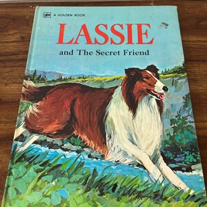 May include: A vintage Golden Book titled "Lassie and The Secret Friend." The cover features a colorful illustration of a Collie dog running through a grassy area with a stream. The book has a light blue background with the title in red.