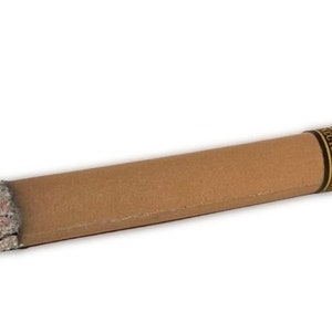 May include: A brown cardboard cigar with a yellow and black label that reads "Nica Rustic" and "Connecticut Broadleaf".
