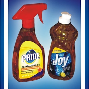 May include: Two bottles of cleaning products. A red and yellow bottle of Pride Revitalizing Oil with the text "Waxes Furniture, without rubbing!" and a yellow bottle of Joy Ultra dish soap with a lemon.