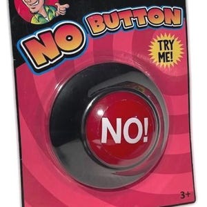 May include: A novelty "NO BUTTON" packaged on a pink and black card. The button is red with white text that says "NO!". The packaging includes the text "TRY ME!" and a cartoon image of a man. The product is from Spencer's.