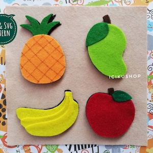 May include: Felt applique pattern for a pineapple, mango, banana, and apple. The pattern is on a beige background with the text "PDF & SVG PATTERN" in a green speech bubble.