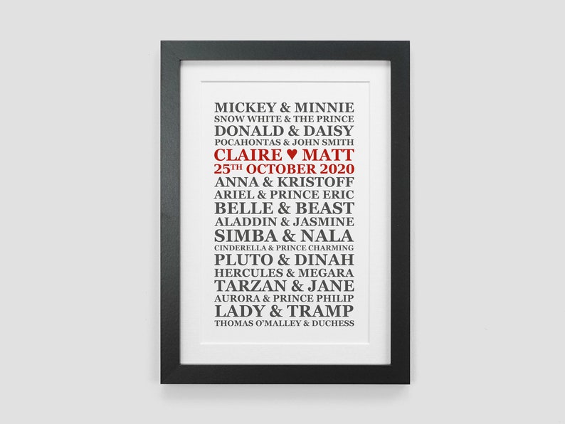 May include: A black framed print with white background and black text. The text lists Disney couples with their names in black and the couple's names Claire and Matt in red. The date 25th October 2020 is also in red.