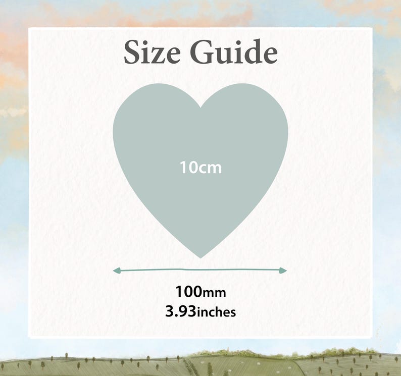 K&ouml;nnte beinhalten: Eine Gr&ouml;&szlig;entabelle mit einem hellblauen Herz. Das Herz ist mit "10cm" beschriftet und die Breite wird mit "100mm" und "3.93 inches" angegeben. Der Text "Size Guide" steht oben.