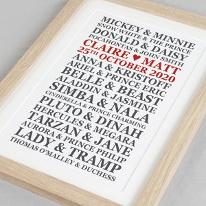 May include: A white framed print with black text listing Disney couples, including Mickey & Minnie, Snow White & The Prince, Donald & Daisy, and more. The text "CLAIRE MATT 25TH OCTOBER 2020" is in red.