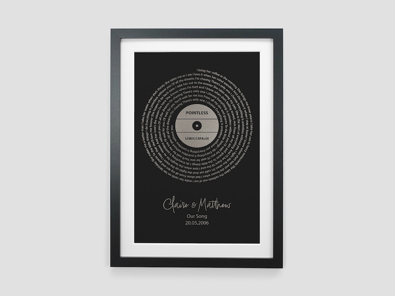 May include: A black and white framed print of a vinyl record with the song lyrics for "Pointless" by Lewis Capaldi. The print includes the names "Claire & Matthew" and the date "20.03.2006".