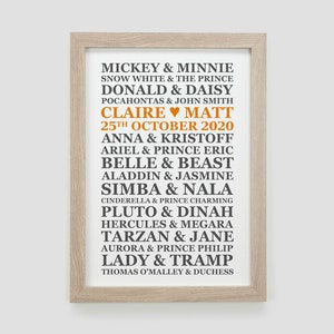 May include: A framed print with a white background and black text listing Disney couples with their names. The text "Claire &hearts; Matt 25th October 2020" is in orange.