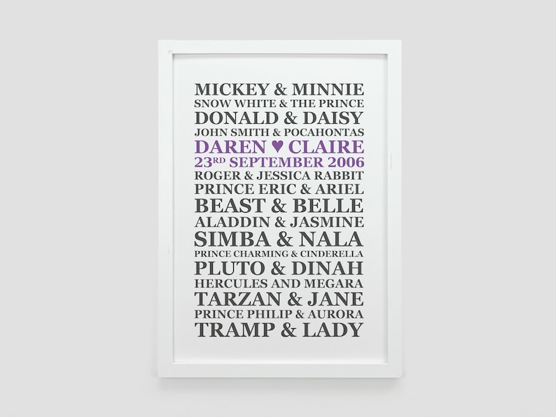 May include: A white framed print with a list of Disney couples in black text. The names Daren and Claire are highlighted in purple with a heart symbol between them. The date September 23rd, 2006 is also included in the list.