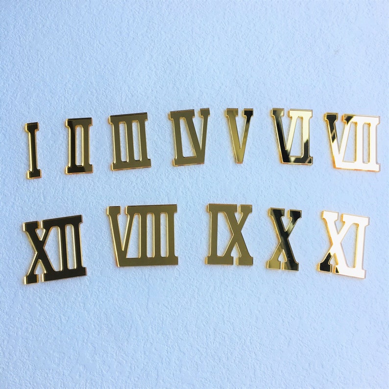 12 pezzi di numeri acrilici specchiati romani per un orologio da parete immagine 1
