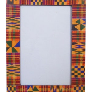 May include: A wooden picture frame featuring a colourful African print design. The frame is made of wood and has a rectangular shape. The print is a traditional African pattern in shades of yellow, red, green, and blue.