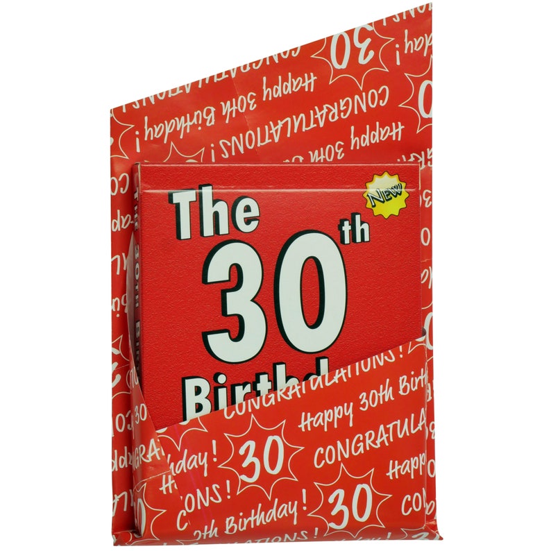 May include: Red card with white text that says "The 30th Birthday". The card is wrapped in red wrapping paper with white text that says "Happy 30th Birthday!" and "Congratulations!"