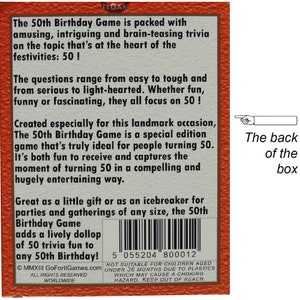 May include: The back of a red box for a 50th birthday game. The box features a barcode and the text "The 50th Birthday Game is packed with amusing, intriguing and brain-teasing trivia on the topic that's at the heart of the festivities: 50!"
