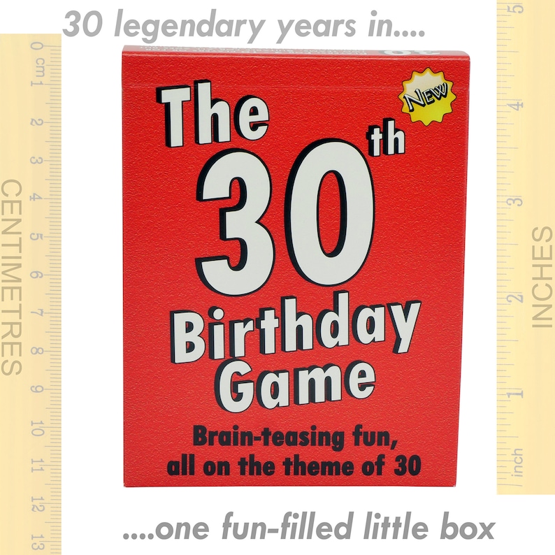 May include: A red box with the text "The 30th Birthday Game" in white and black lettering. The box has a yellow star with the word "New" on it. The text "Brain-teasing fun, all on the theme of 30" is printed below the game title.
