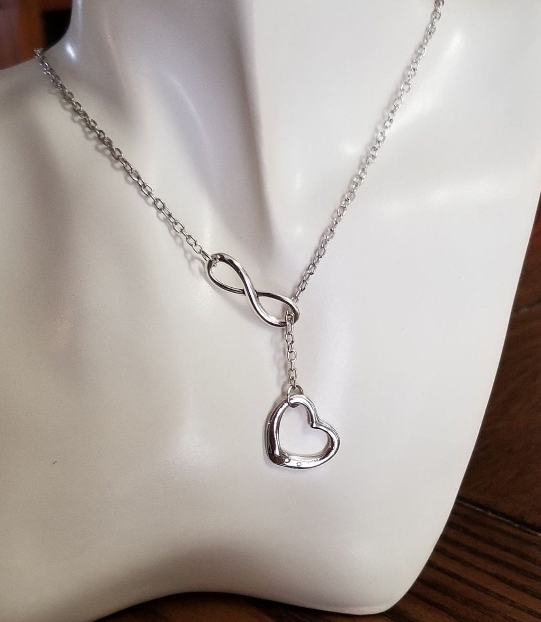 Infinity lariat shop necklace