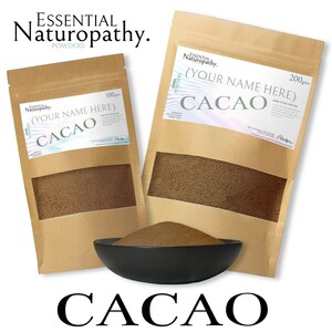 May include: Two brown paper bags with white labels. The labels have the text "Essential Naturopathy. Powders" and "(Your Name Here) CACAO". The bags contain a brown powder. One bag is labelled 100g and the other is labelled 200g. A small black bowl with brown powder is in front of the bags.