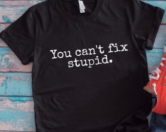You Can't Fix Stupid, Black Unisex Short Sleeve T-shirt