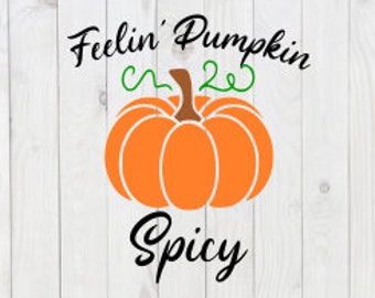 May include: A digital design featuring an orange pumpkin with a green stem and the text "Feelin' Pumpkin Spicy" in black.