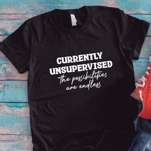 Currently Unsupervised, the Possibilities are Endless, Black Unisex Short Sleeve T-shirt with FREE SHIPPING