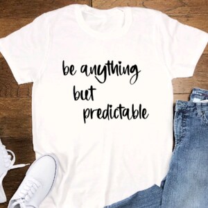Be Anything But Predictable, Unisex White Short Sleeve T-shirt with FREE SHIPPING