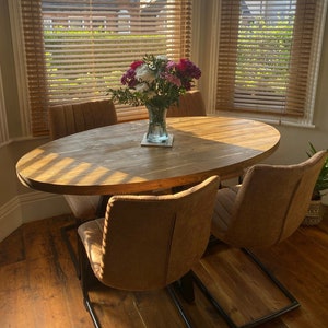 Oval Dining Table Handmade in the UK. Bespoke solid wood pedestal dining table with steel base. Pine/Textured/Ash/Oak The Monton