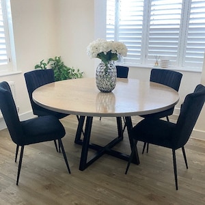 Round quartz dining table discount