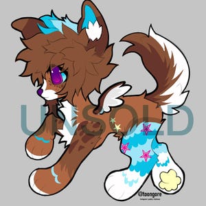 May include: A cartoon illustration of a brown and white canine-like creature with blue and purple accents. The creature has a fluffy mane, wings, and is wearing blue and pink patterned leg warmers. The word "UNSOLD" is visible.