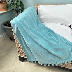 Jeté en velours bleu canard avec bordure à pompons, jeté de lit en coton