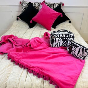 fuchsia pink velvet pompom throw blanket