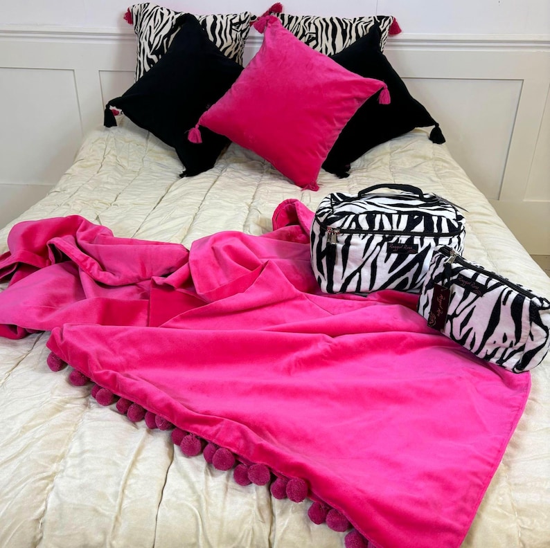 fuchsia pink velvet pompom throw blanket